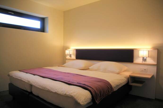 Imagen de la habitación del Wohnmotel. Foto 35