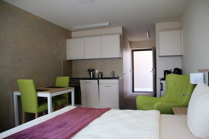 Imagen de la habitación del Wohnmotel. Foto 36