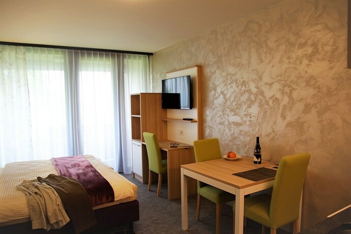 Imagen de la habitación del Wohnmotel. Foto 37