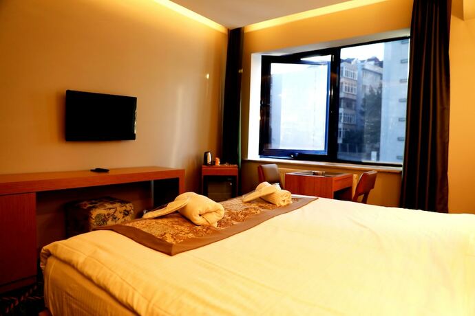 Imagen de la habitación del Won Plaza Otel. Foto 15