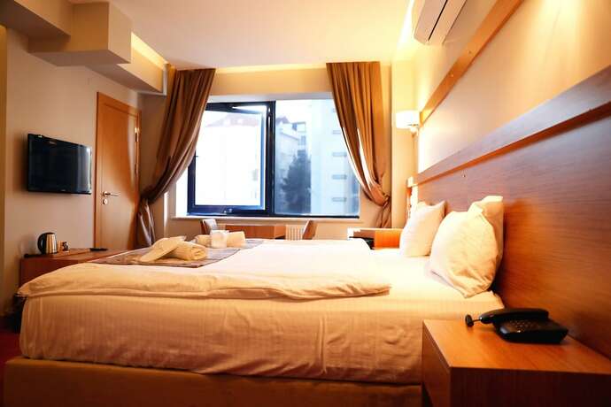 Imagen de la habitación del Won Plaza Otel. Foto 17