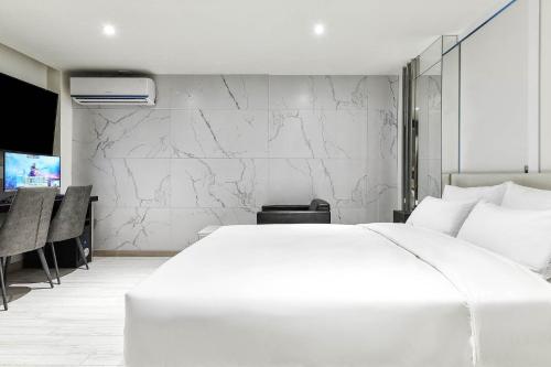 Imagen de la habitación del Wonju May hotel. Foto 16