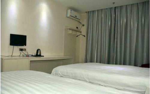 Imagen de la habitación del Wudangshan Tianbao Jiuru Inn. Foto 6