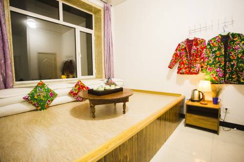 Imagen de la habitación del Wusong Island Hujia Inn. Foto 4