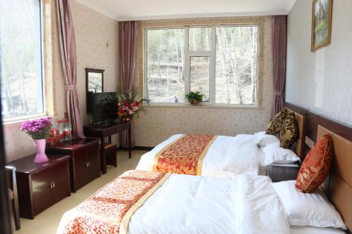 Imagen de la habitación del Wutai Mountain Fenglin Valley Guesthouse. Foto 8