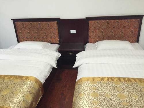 Imagen de la habitación del Wutaishan Kaifen Inn. Foto 2