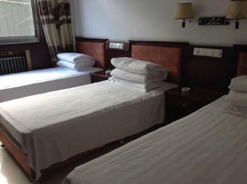 Imagen de la habitación del Wutaishan Xin Tai Inn. Foto 2