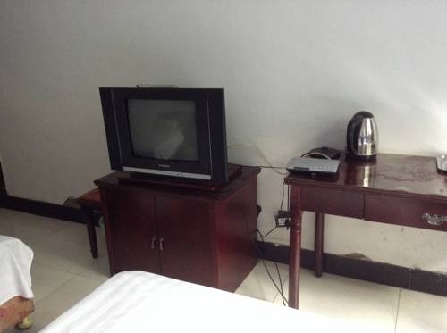 Imagen de la habitación del Wutaishan Xin Tai Inn. Foto 3