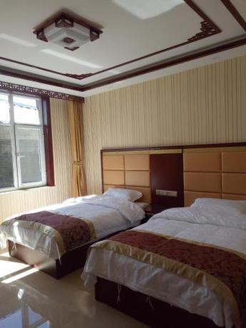 Imagen de la habitación del Wutaishan Youth Hotel. Foto 6