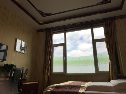 Imagen de la habitación del Wutaishan Youth Hotel. Foto 9