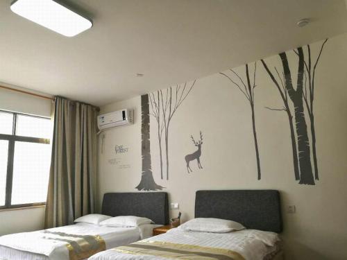 Imagen de la habitación del Wuyishan Zaijia Guesthouse. Foto 8