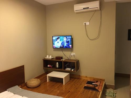 Imagen de la habitación del Wuyuan Jiangling Port Homestay. Foto 10