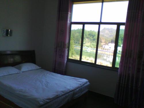 Imagen general del Wuyuan Lvxing Homestay. Foto 6