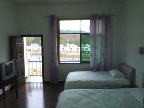 Imagen general del Wuyuan Lvxing Homestay. Foto 8