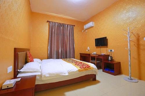 Imagen de la habitación del Xiamen Huizhongzhijia Inn. Foto 6