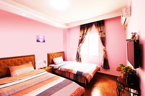 Imagen de la habitación del Xiamen North Station Suyi Inn. Foto 4