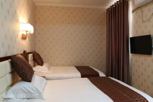 Imagen de la habitación del Xi'an Xiangyang Airport Mengzhilan Hotel. Foto 3