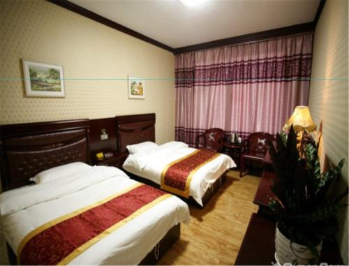 Imagen de la habitación del Xiangange Inn Wutai. Foto 8