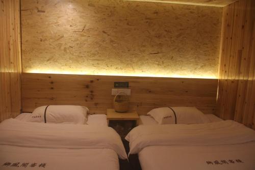 Imagen de la habitación del Xiangfengge Inn. Foto 4