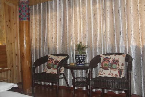 Imagen de la habitación del Xiangfengge Inn. Foto 5