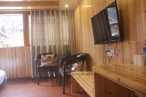 Imagen de la habitación del Xiangfengge Inn. Foto 6