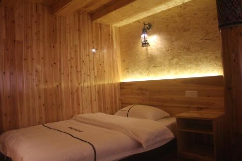 Imagen de la habitación del Xiangfengge Inn. Foto 7