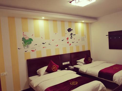 Imagen de la habitación del Xiangliqin Boutique Homestay. Foto 8