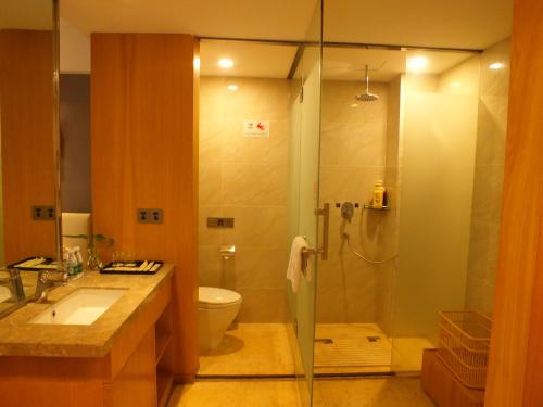 Imagen de la habitación del Xiangyang Huayi Hotel. Foto 5