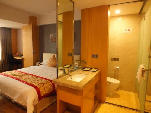 Imagen de la habitación del Xiangyang Huayi Hotel. Foto 6