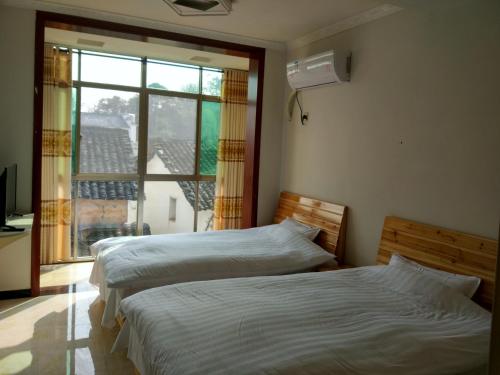 Imagen de la habitación del Xiaodai Guesthouse. Foto 6