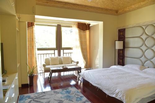 Imagen de la habitación del Xiaoliu Inn. Foto 6