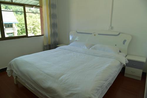 Imagen de la habitación del Xiaoliu Inn. Foto 7