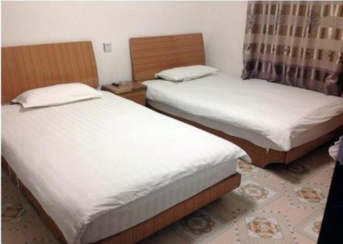 Imagen de la habitación del Xifeng Inn Xianyang. Foto 2