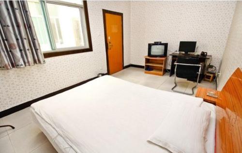 Imagen de la habitación del Xifeng Inn Xianyang. Foto 3