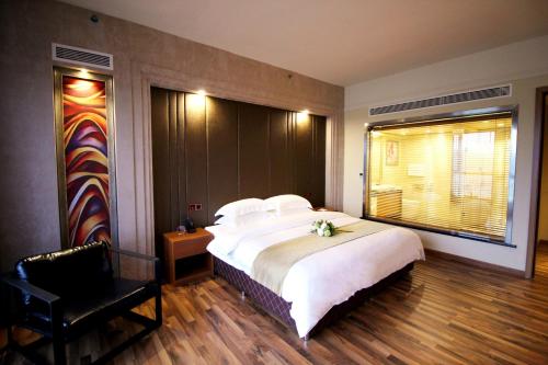 Imagen de la habitación del Xihui Hotel. Foto 16