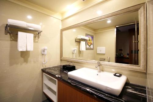 Imagen de la habitación del Xihui Hotel. Foto 17