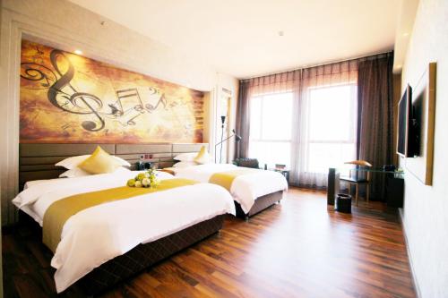 Imagen de la habitación del Xihui Hotel. Foto 18