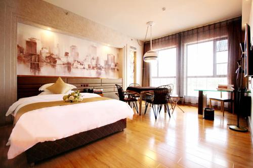 Imagen de la habitación del Xihui Hotel. Foto 19