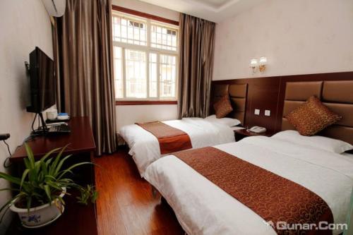 Imagen de la habitación del Xin Yuan Hotel. Foto 7
