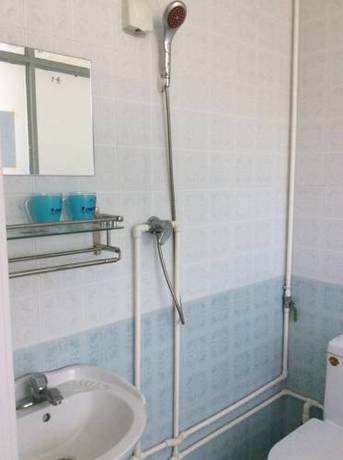 Imagen de la habitación del Xingfu Xiaoyuan Homestay. Foto 3