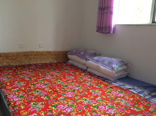 Imagen de la habitación del Xingfu Xiaoyuan Homestay. Foto 4