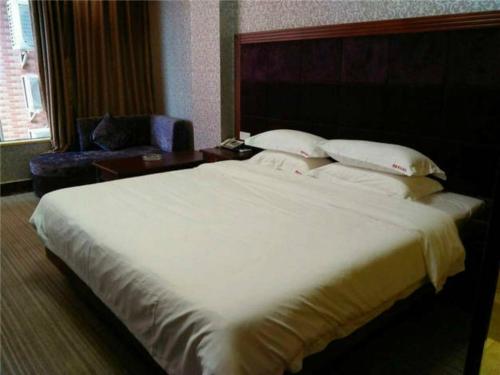 Imagen general del Xinglong Huangxin Business Inn. Foto 1