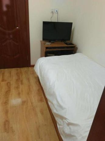 Imagen de la habitación del Xinming Fashion Hotel. Foto 6