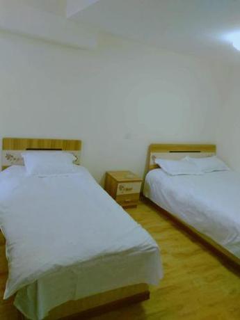 Imagen de la habitación del Xinming Fashion Hotel. Foto 7