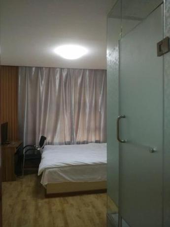 Imagen de la habitación del Xinming Fashion Hotel. Foto 8