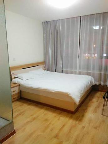 Imagen de la habitación del Xinming Fashion Hotel. Foto 9