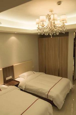 Imagen de la habitación del Xinyang City Celebrity Apartment. Foto 9