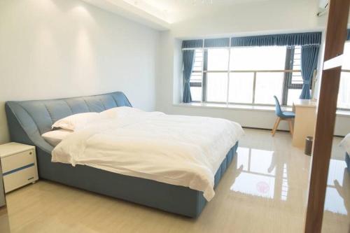 Imagen general del Xinyang City Celebrity Apartment. Foto 1