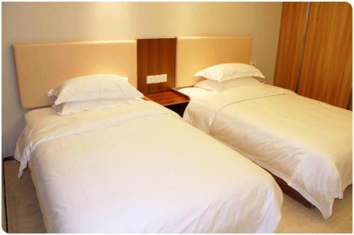 Imagen general del Xinyang City Celebrity Apartment. Foto 2