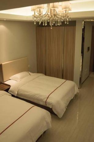 Imagen general del Xinyang City Celebrity Apartment. Foto 5
